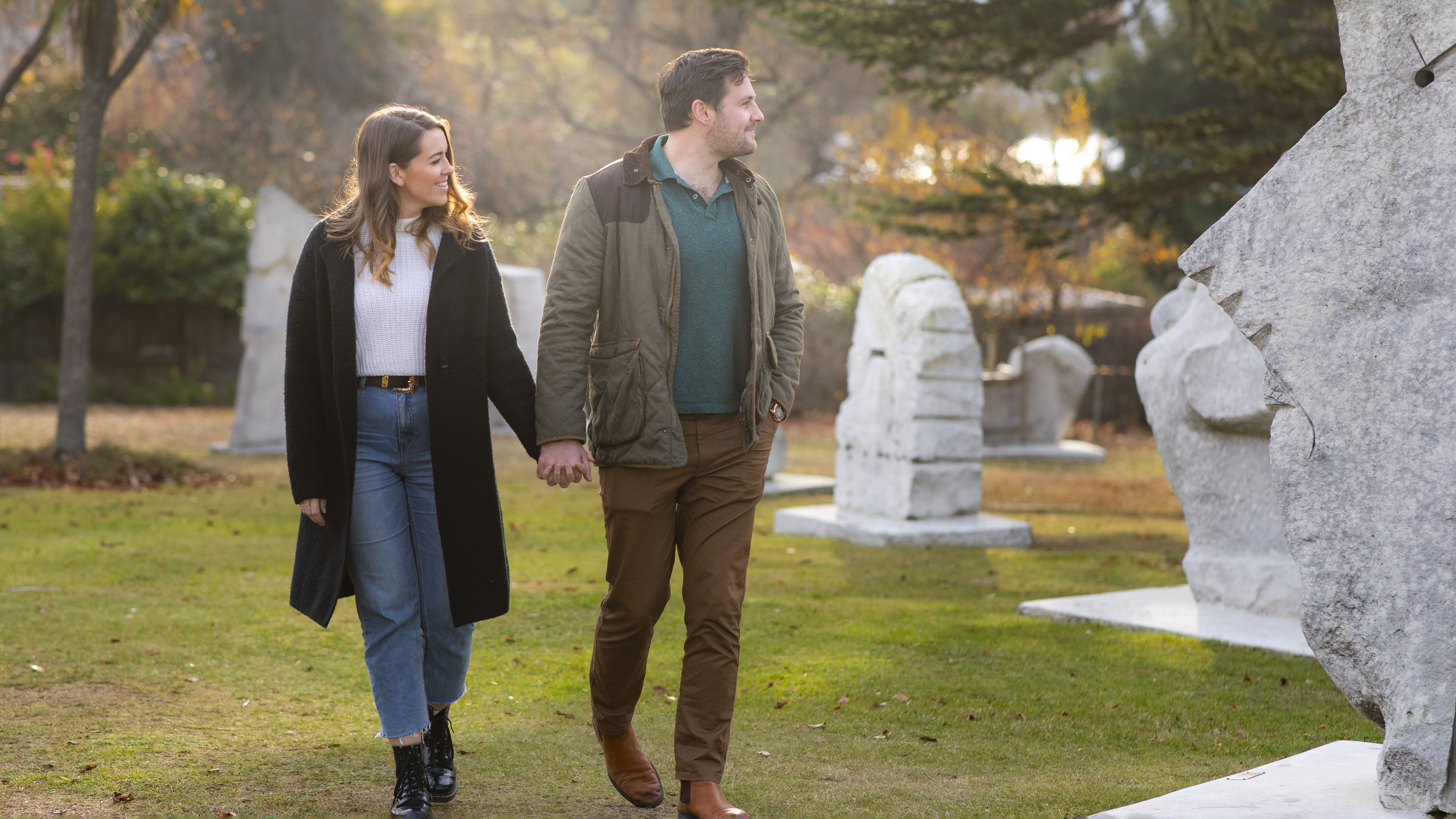 couple strolling in the rock garden